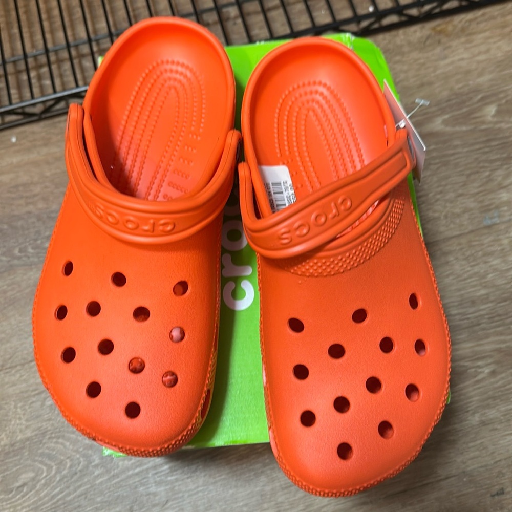CROCS orange Sandals with Classic Design and Comfort size 7 women